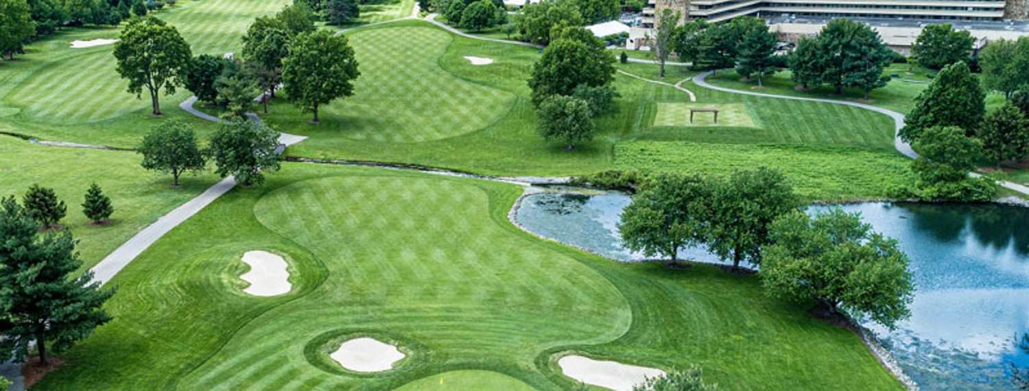 A championship golf fairway in the Kentucky bluegrass at golden hour